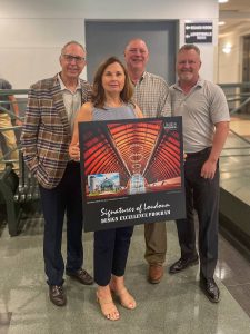 Steve Schulte, Kim Adams, Danny George and architect Sean Porter accepted the Signatures of Loudoun Design Excellence 2024 Pace-Setters award for The Barn at Brambleton.